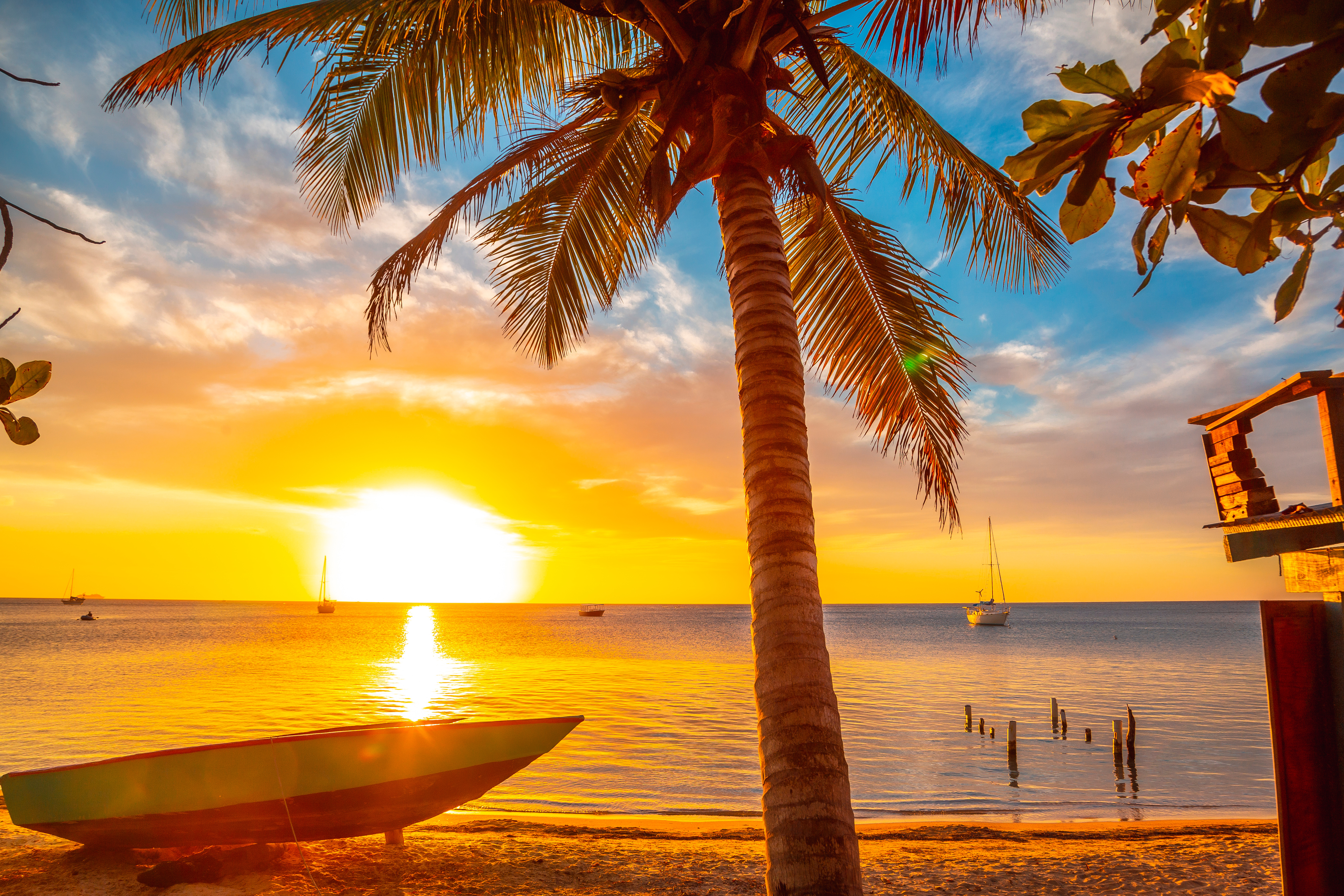Beach Sunset On Roatan Island, Honduras Beach Sunset On Roatan Island, Honduras