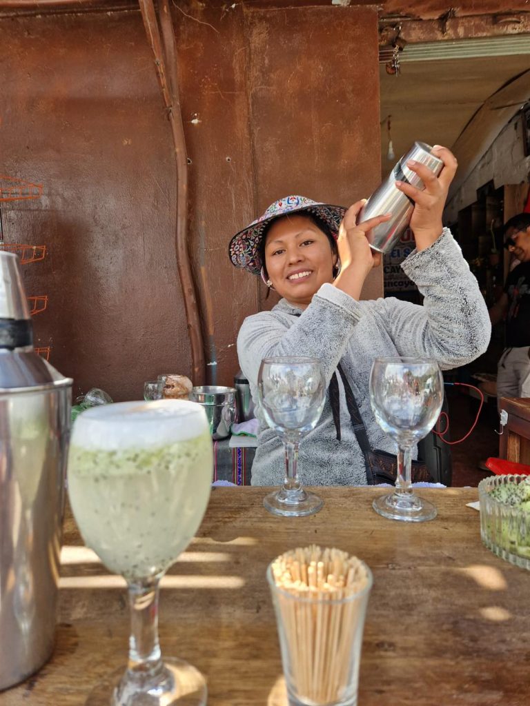 Making Pisco Sours in the local market stall